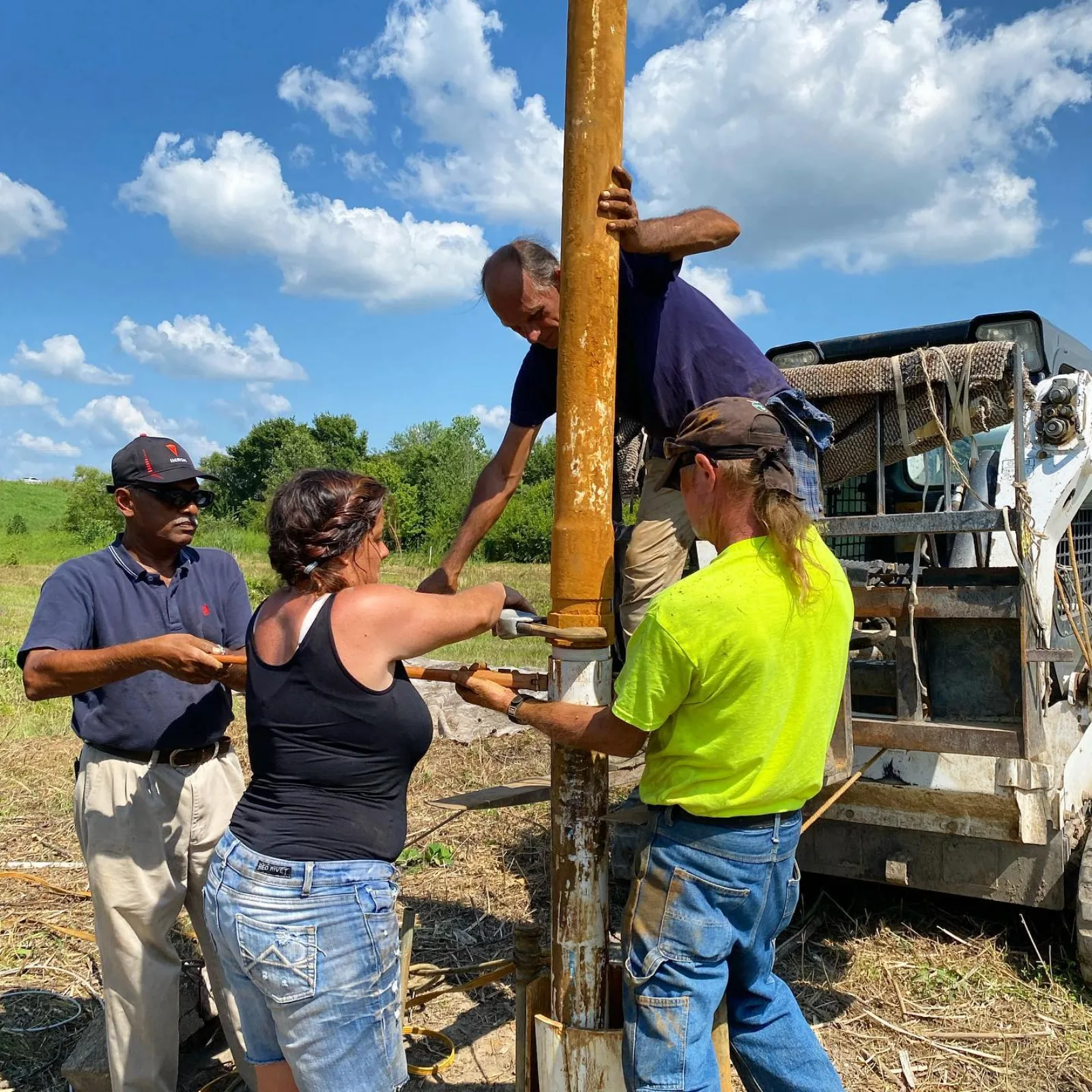 The Sugarloaf crew working together on an install in the field